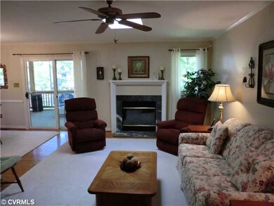 Living Room - Gas fireplace and HARDWOOD FLOORS!