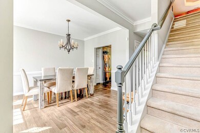 Beautiful Foyer with Lots of Moldings and Engineer