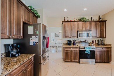 Kitchen featuring stainless steel appliances and granite counters