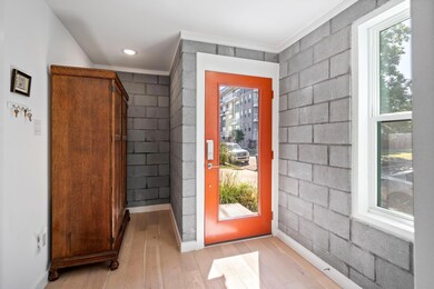 Doorway to outside with plenty of natural light, b