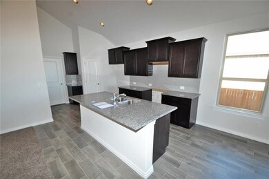 Kitchen  The open concept kitchen will feature hig