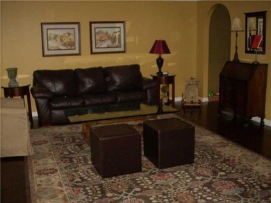 Living Room. Spacious room with double arches lead
