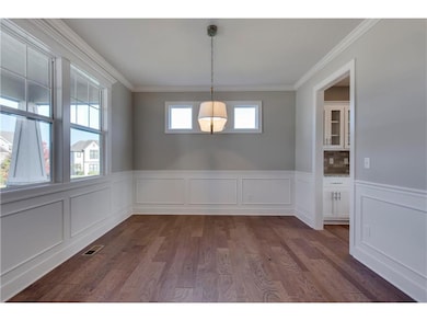Dining Room showcasing custom two toned walls & wa