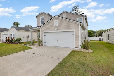 Traditional-style house featuring driveway, centra