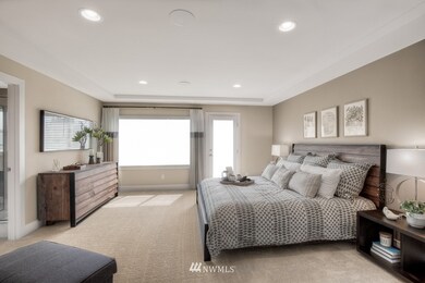 Spacious primary bedroom. Photo of Newhalem 2 D previously built model home is used for representation purposes. Orientation, colors, design elements, and finish details will vary.