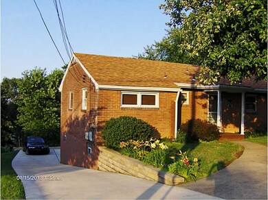 Exterior Front. Two year old driveway.  Stone wall