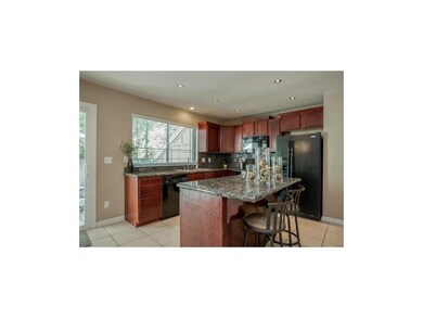 Sharp updated kitchen overlooking the patio. #SoPr