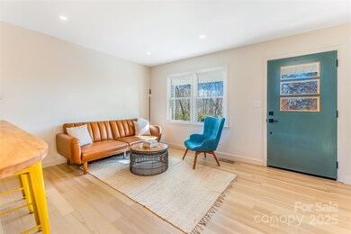 Open concept kitchen with bar and sitting area.  