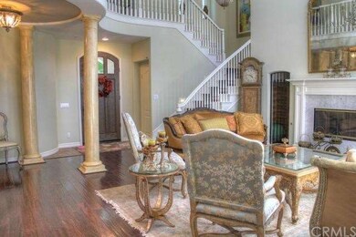 Beautiful wood flooring and stair case. high ceili