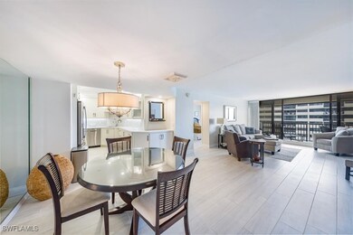Dining area with a wall of windows