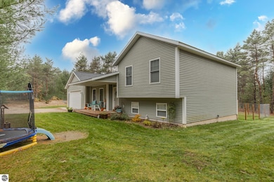 19090 Creekside Ln, Interlochen, MI 49643 - photo 2