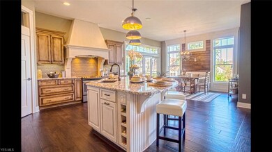View from Foyer - Stellar center island w/seating 