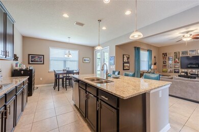 Gourmet kitchen features a casual dining nook with
