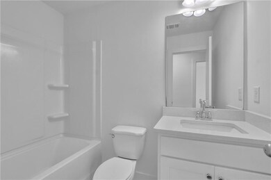 Full bathroom with tub / shower combination, visib