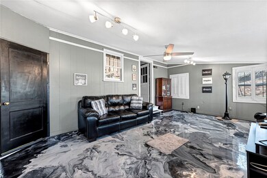 Large den is great for 2nd living room, office, ga