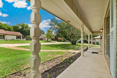 View of patio with a porch