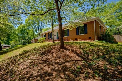 Large yard leading up to this beautiful all brick ranch