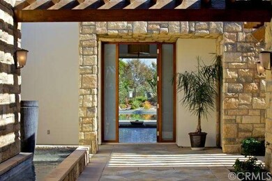 Natural stone siding and the subtle, soothing wate