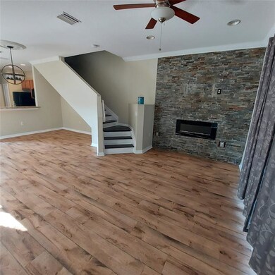 Custom Stoned wall with electric fireplace