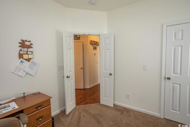 Bedroom featuring carpet floors