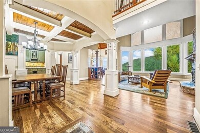 Main level dining area with views into family room