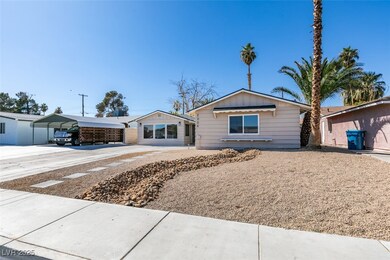View of front of home featuring concrete driveway,