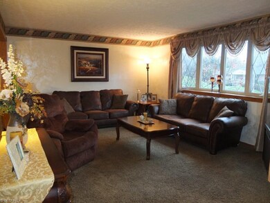 Formal living room with bay window.