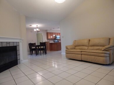 Tiled living area, vaulted ceilings