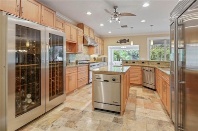 Kitchen with 400+ bottle wine cooler and 2 dishwas