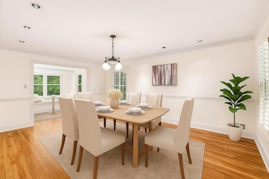 Formal Dining Room With An Adjacent Built-In Breakfast Nook