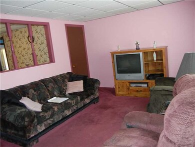 Living Room. Hardwood floor under carpet