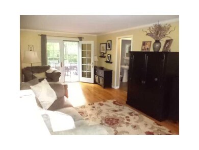 Living Room. This charming room has hardwood floor