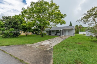 121 E 3rd St, Lehigh Acres, FL 33936 - photo 2