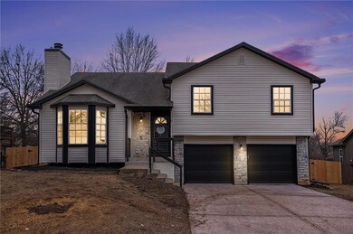 207 W Laredo Trail, Raymore, MO 64083 - photo 2