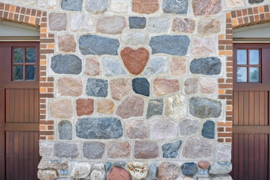 13001 Twilight Road - Hand Picked Lake Mille Lacs Heart Stones, The Original Mason Strategically Placed Many Throughout the Exterior of the Home (and Interior)