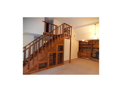Built-ins under the stairs leading to the 4th bedr