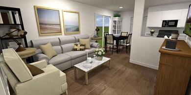 Living room with wood finished floors and recesse