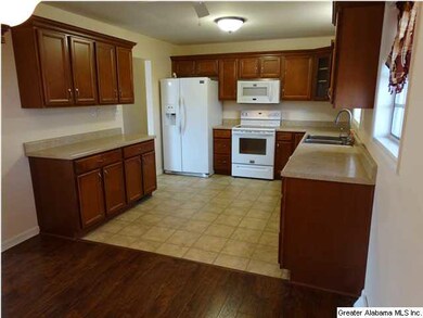 Updated kitchen with new appliances, new cabinets,
