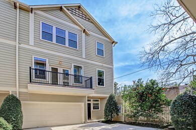 Oversize 2 car garage with large, inviting front b