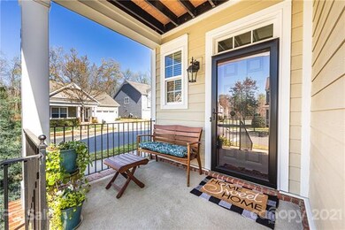 Covered front porch says WELCOME HOME!