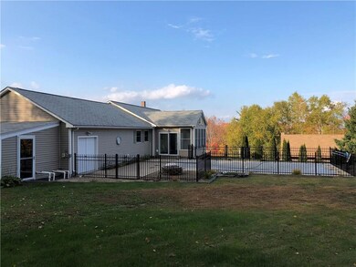 Back view showing the in-ground pool...