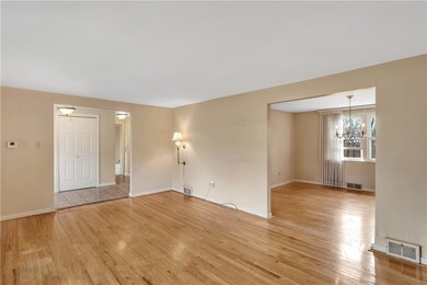 View of living room into connecting formal Dining