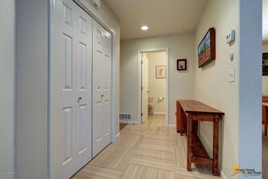 Entry hall to garage and powder room