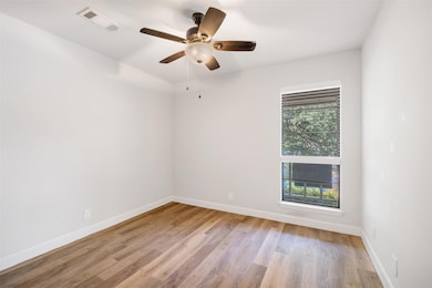 Unfurnished room featuring light wood-style floor