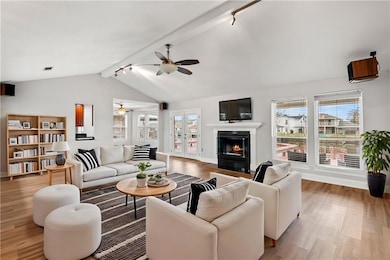 virtually staged. Large open living room with cozy