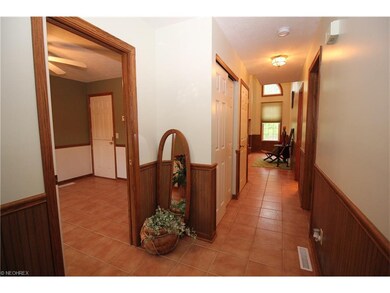 Tiled foyer opens to an amazing vaulted great room