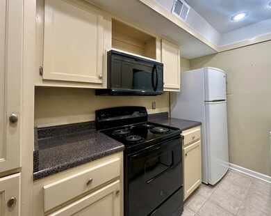 Kitchen featuring a new range and microwave instal