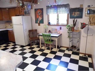 Kitchen. The refrigerator,electric oven and dishwa