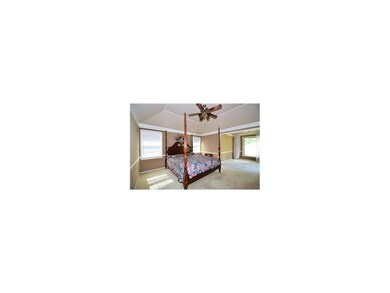 Vaulted Master & Sitting Room opens to patio & gol