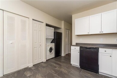Fridge, W/D, dishwasher view from kitchen